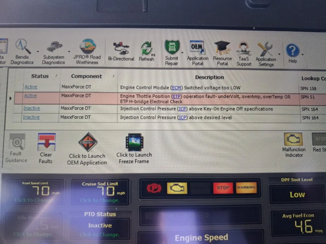 Professional JPRO diagnostic screen displaying fault codes for a MaxxForce DT engine during a roadside repair.